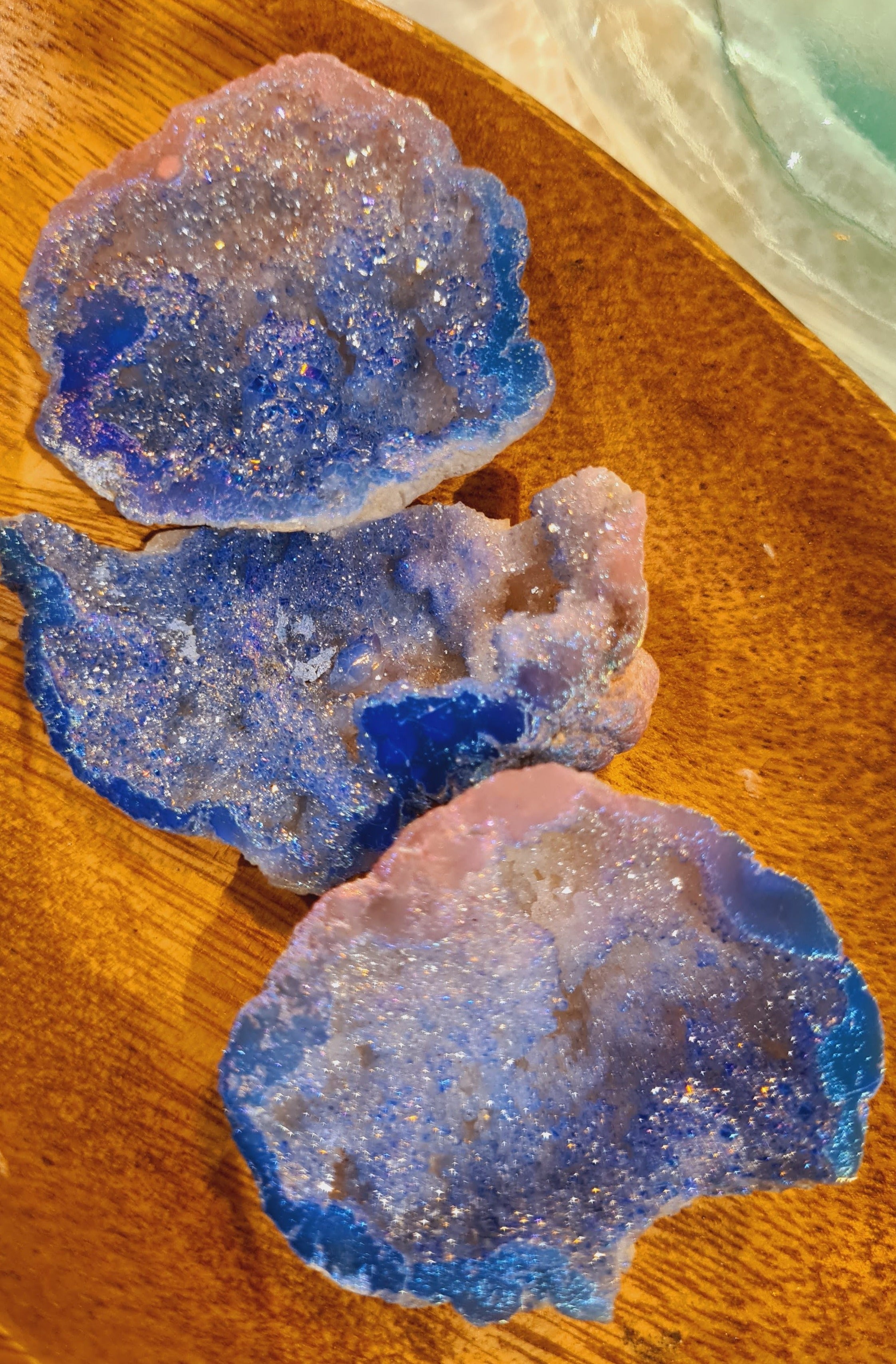 Aura Quartz Geode in pink & blue. Coated in precious metals.